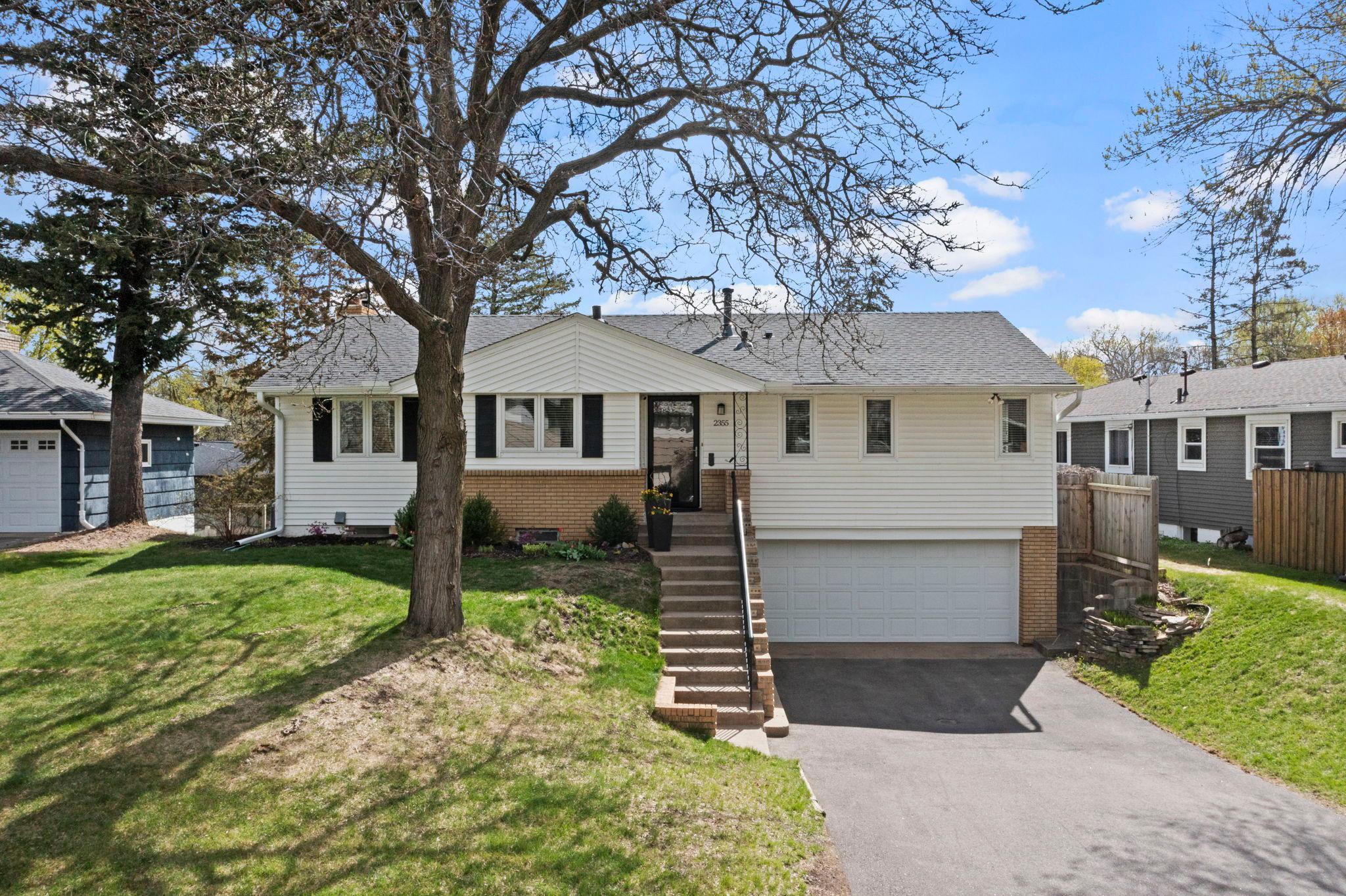 Standout curb appeal with new roof in 2023! Move in ready and beautiful inside and out.
