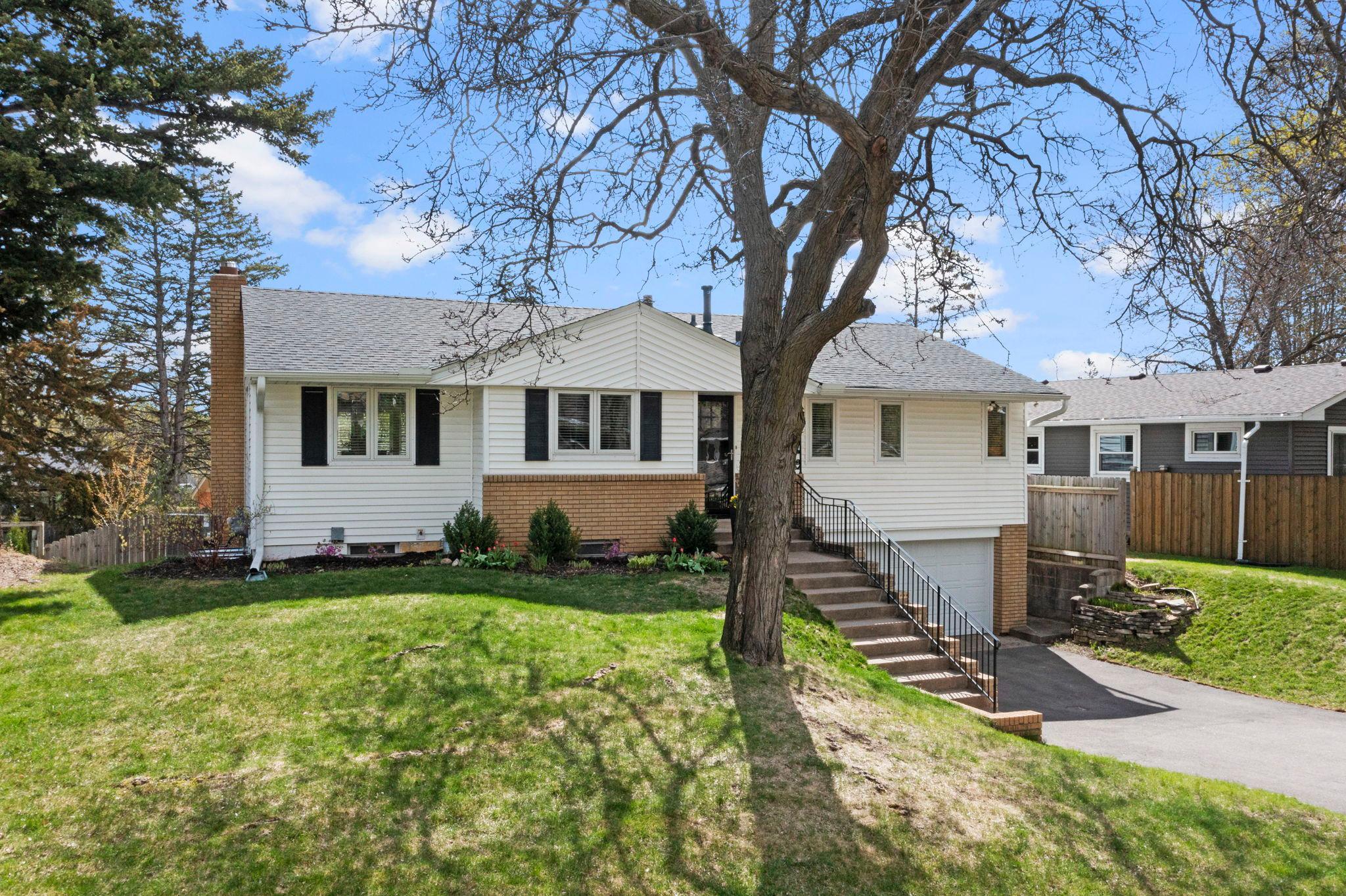 Standout curb appeal with new roof in 2023! Move in ready and beautiful inside and out.
