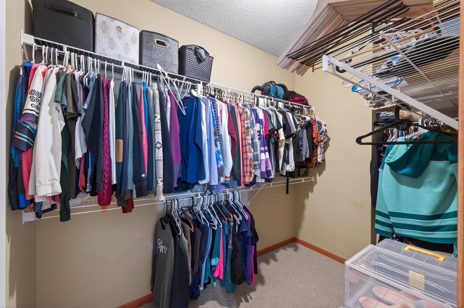 Primary walk-in closet.