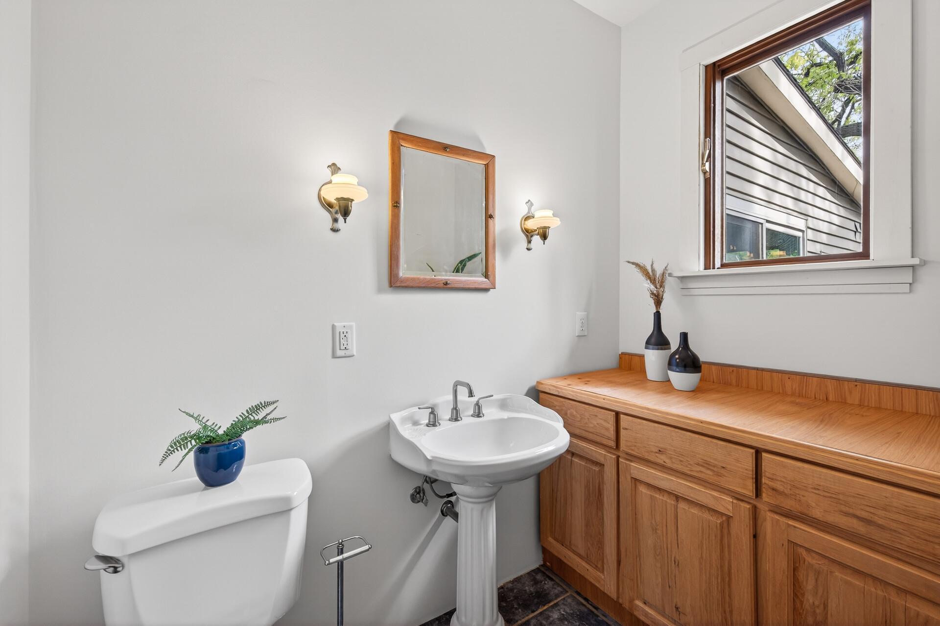 1/2 Bath on Main Floor, Enough Room to Add a Shower/Tub