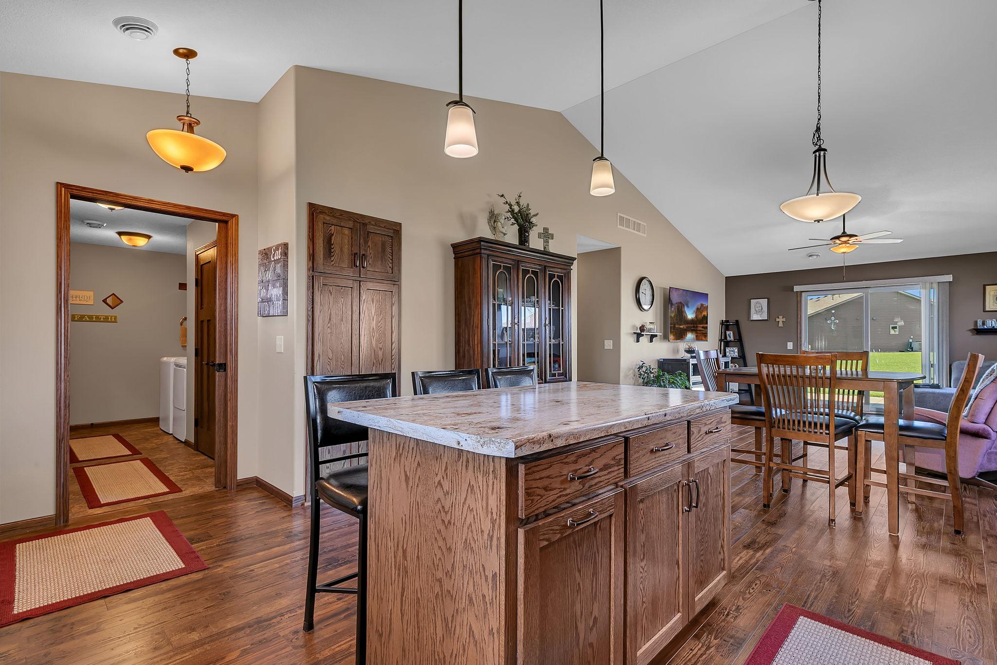 Open layout with built in pantry & center kitchen island