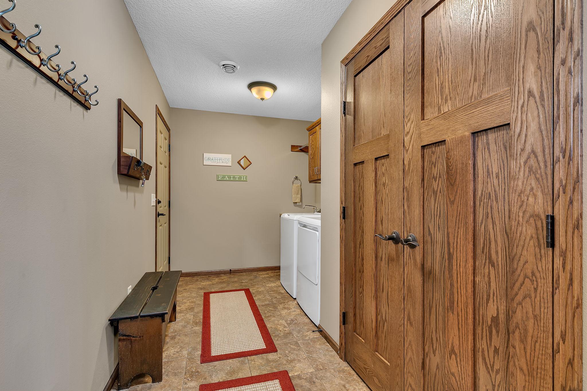 Spacious Laundry area with large coat closet