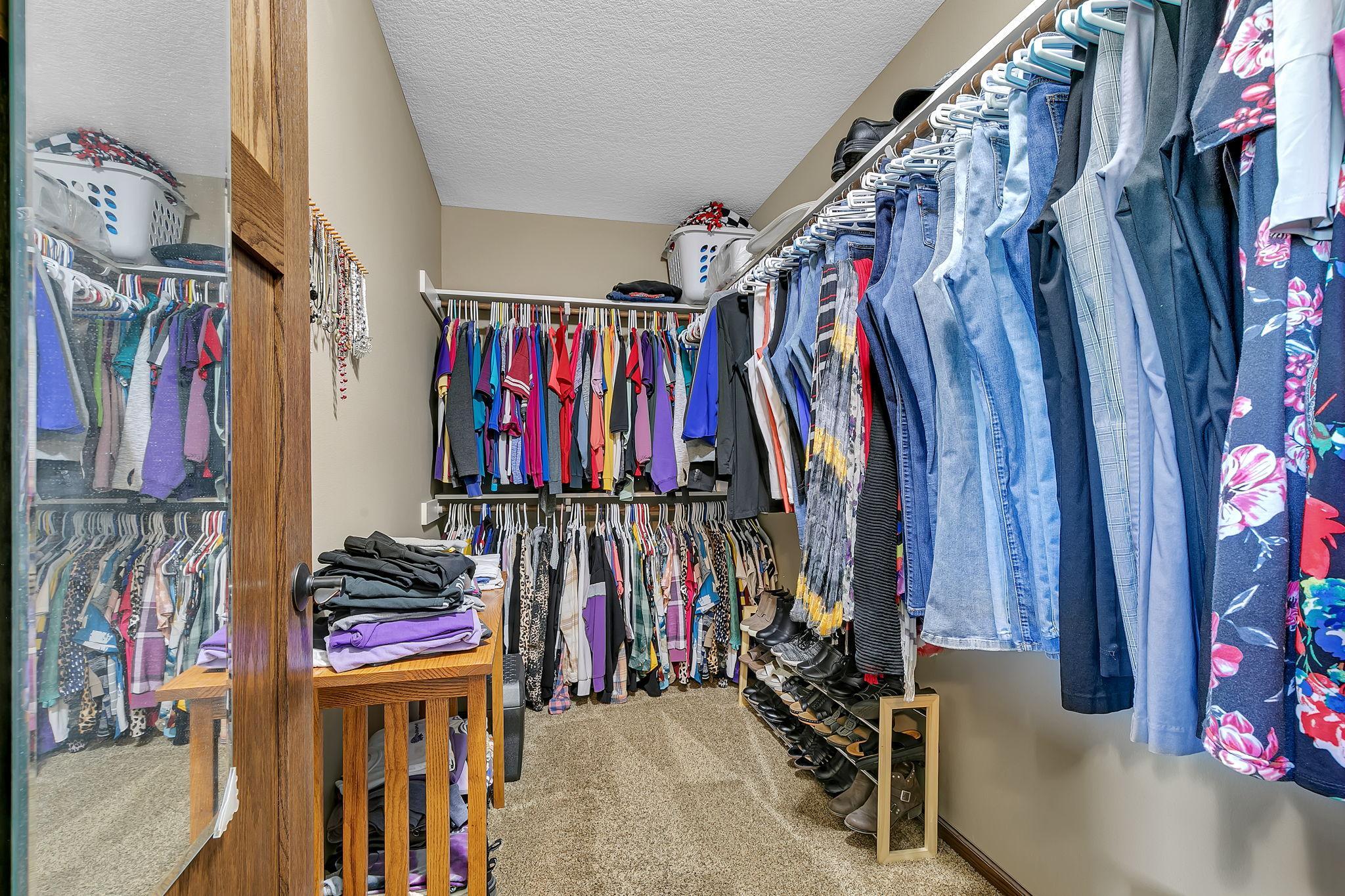 Large primary bedroom walk in closet