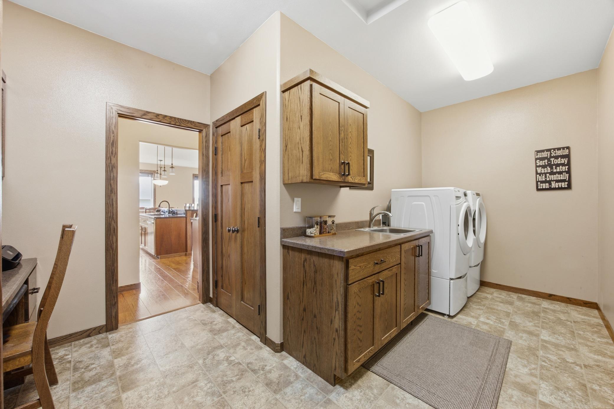 Main Floor Laundry Area W/ Sink