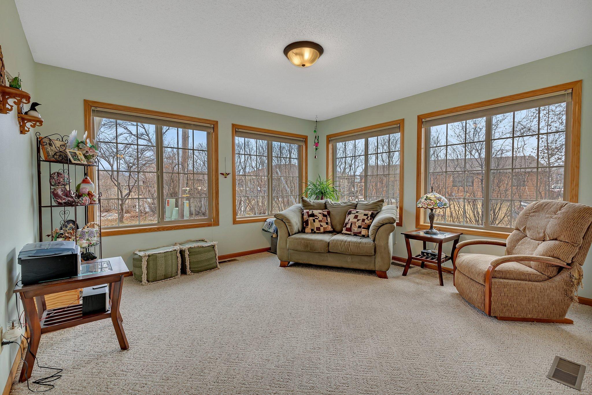 Enjoy the sunroom. Lots of natural light.