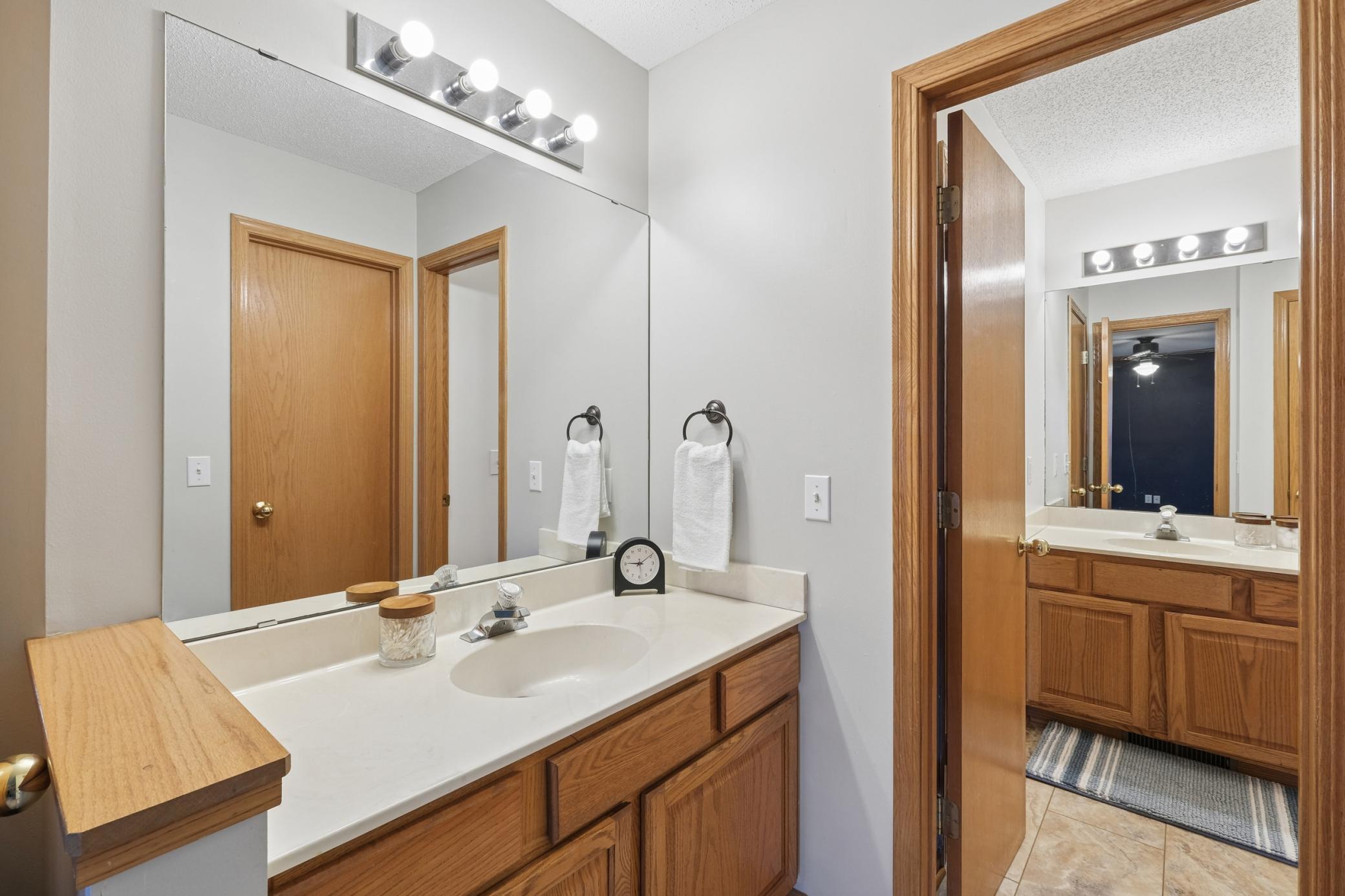 Upper level bath with dual vanity