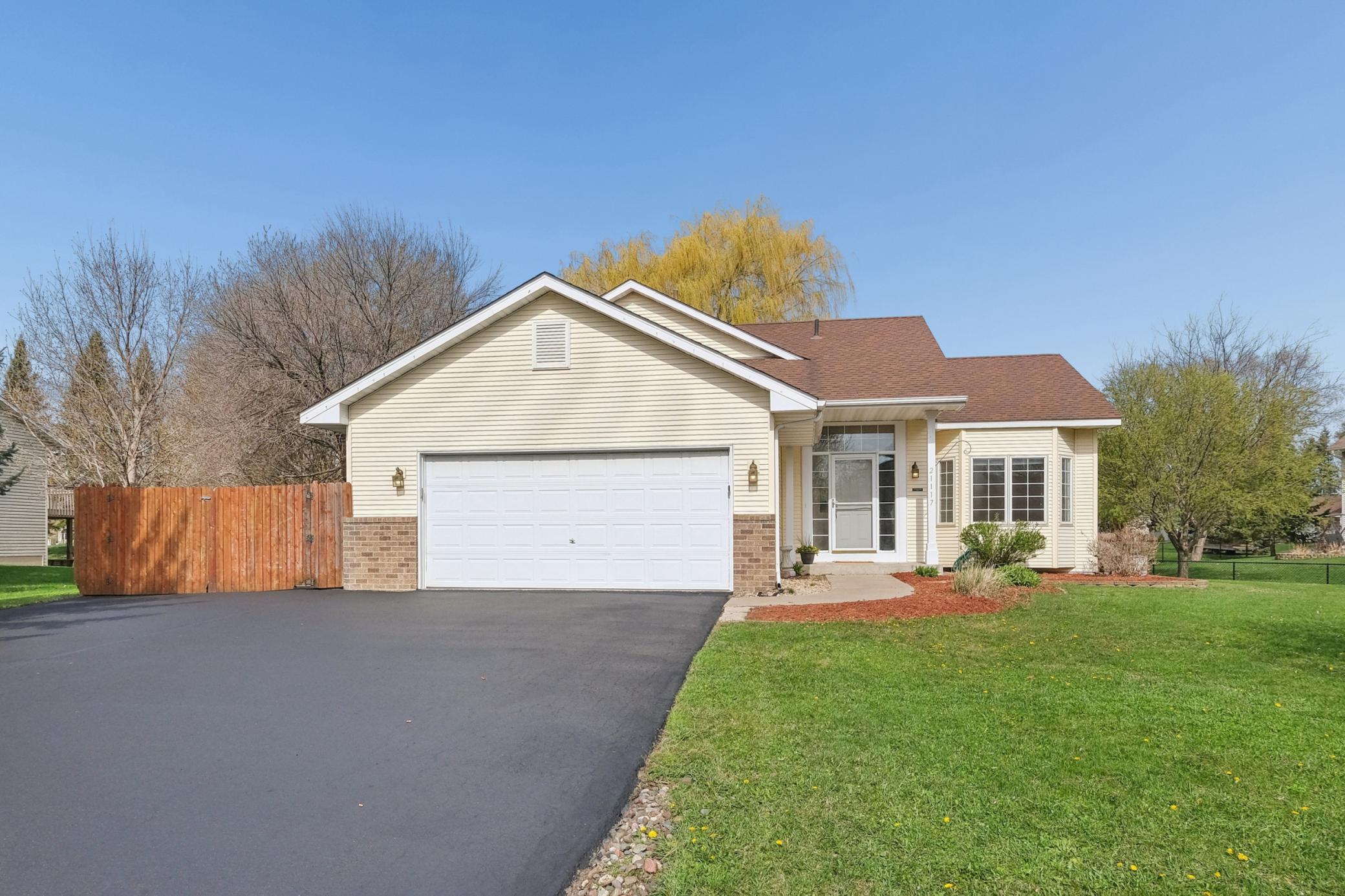 Bonus driveway gated storage - perfect for boats, toys, and trailers