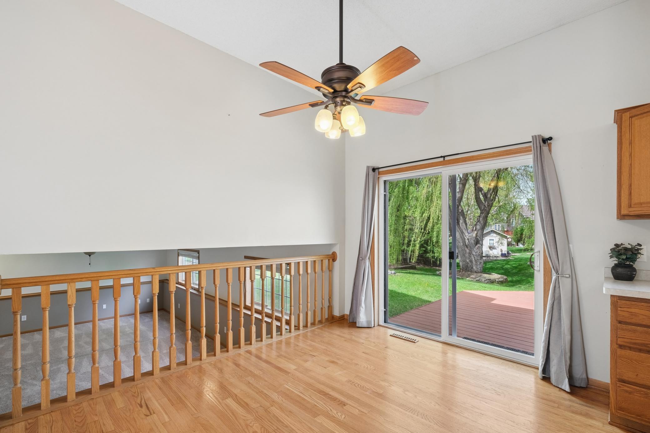 Gleaming hardwood floors and new sliding glass door