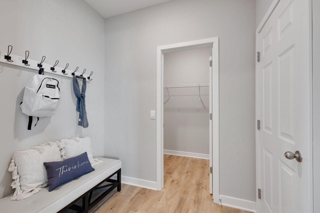 Large mudroom with walk-in mudroom shower provides plenty of space to remove all the Minnesota winter layers!