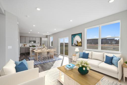 Gorgeous main floor that seamlessly flows from kitchen to dining to living