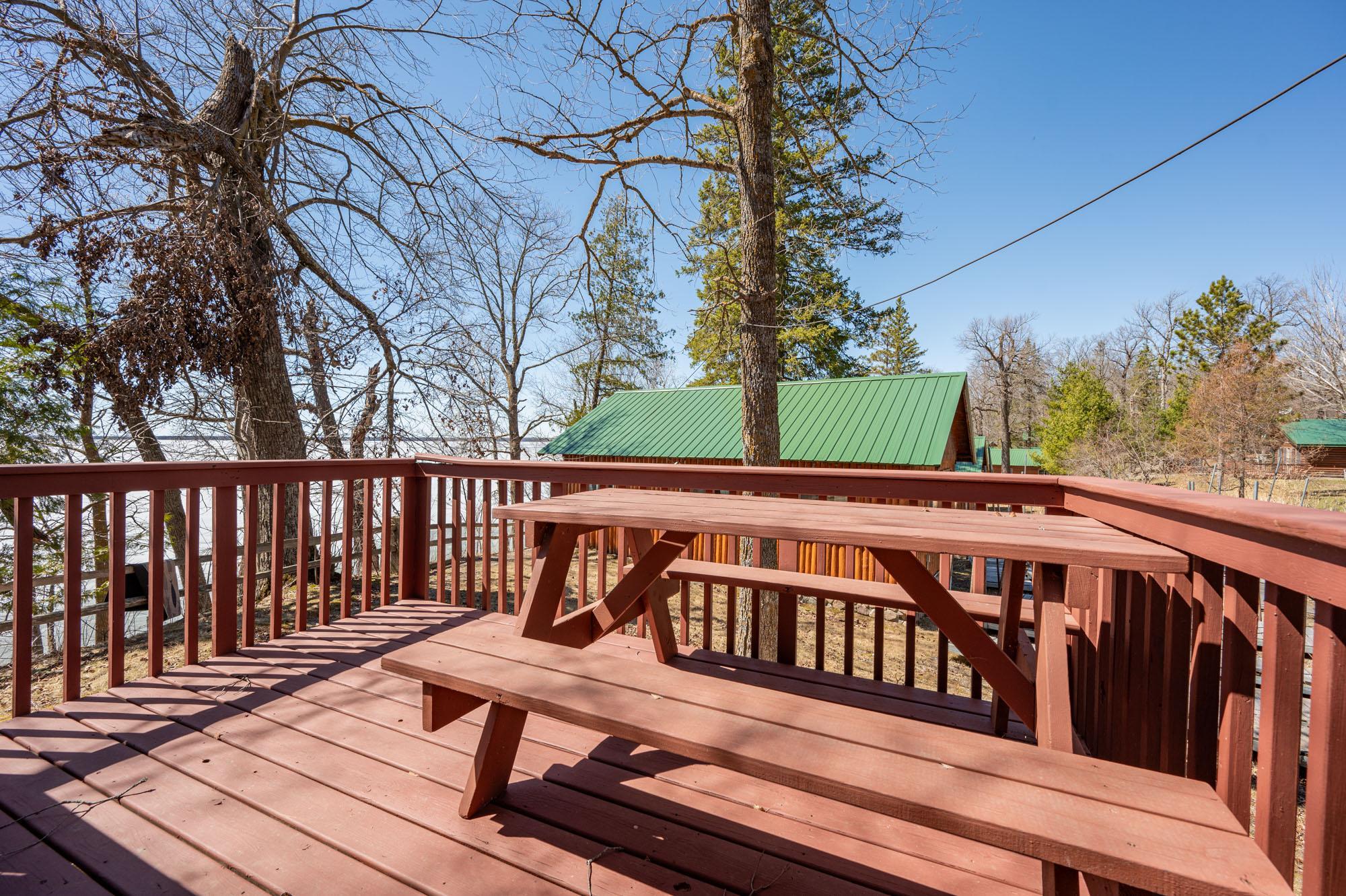 Large deck overlooking Bowstring Lake