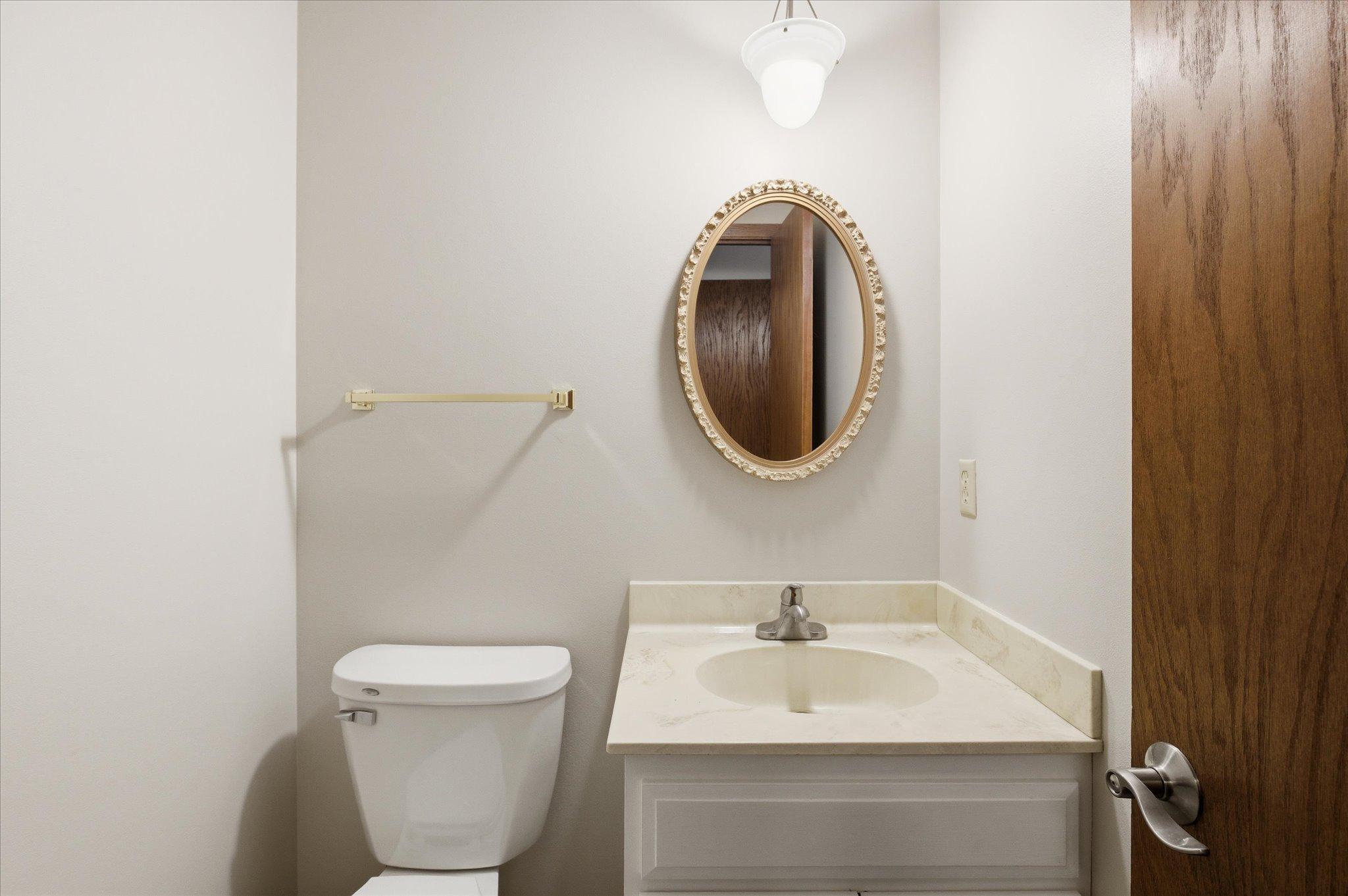 Conveniently located on the main floor, the half bathroom adds extra functionality for guests and daily living.