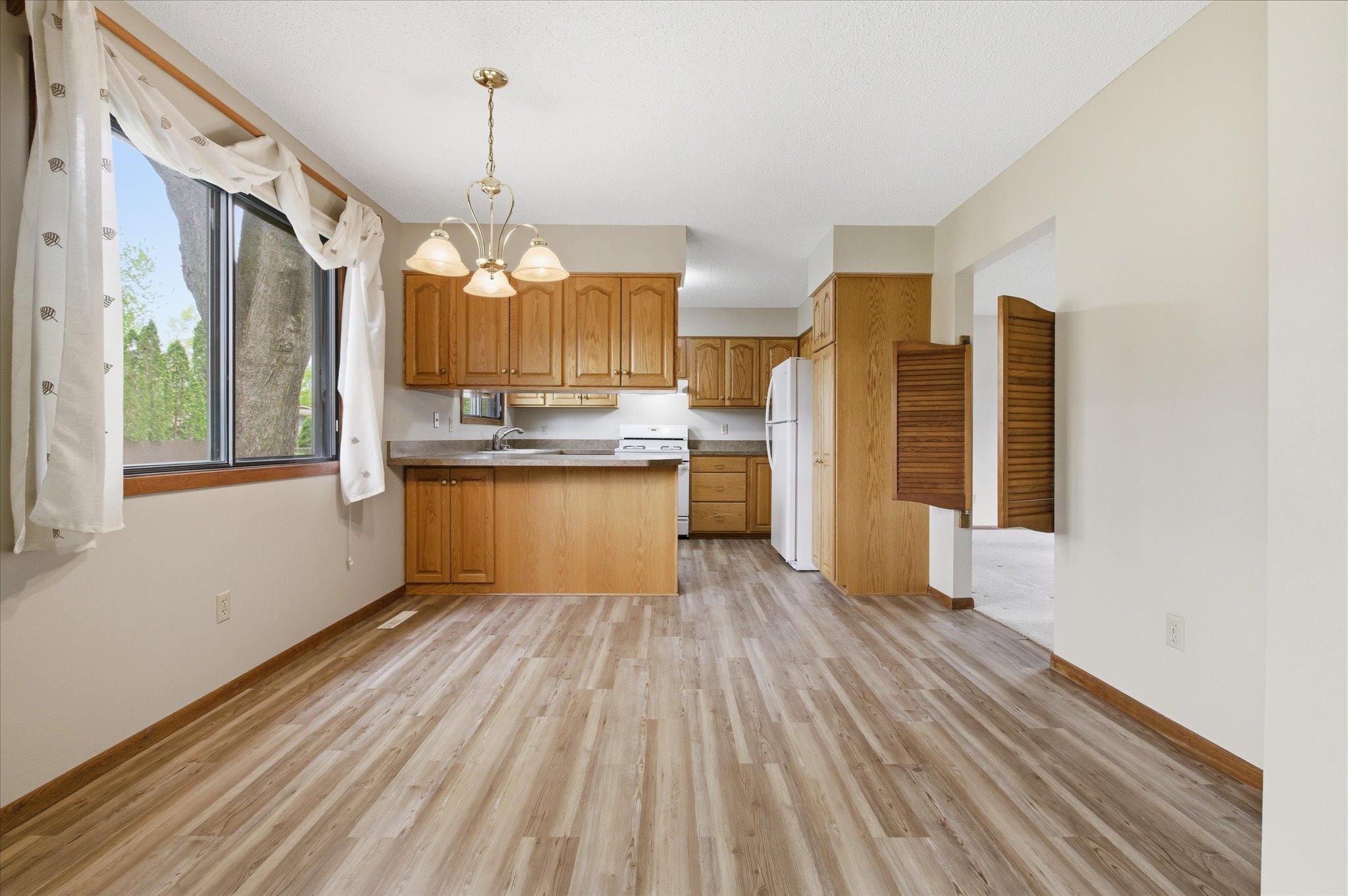 Natural light fills the dining area and kitchen, creating a bright and cheerful atmosphere you’ll appreciate every day.