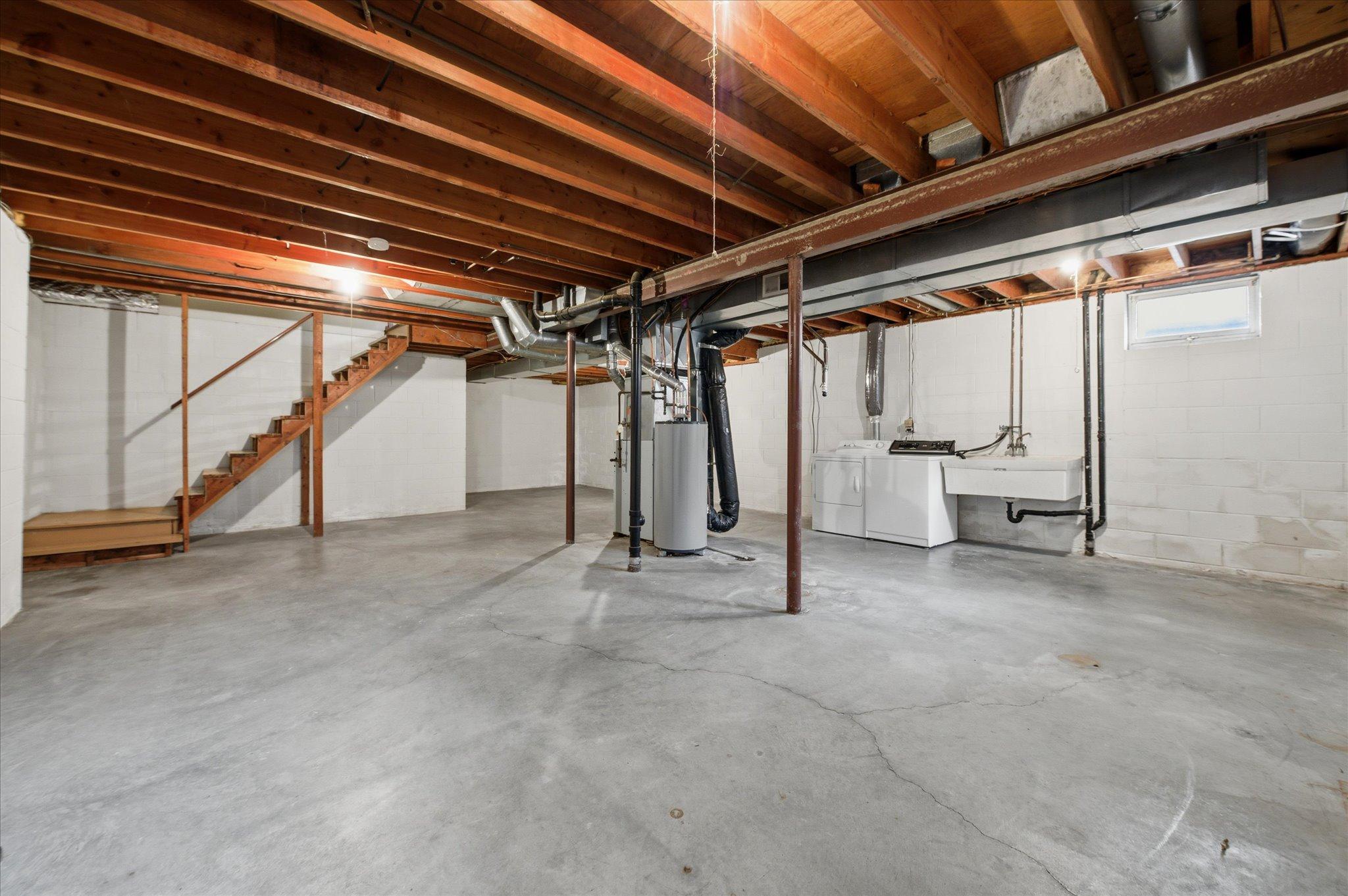 The unfinished basement offers incredible potential for future expansion, whether you envision additional bedrooms, a bathroom, recreation space, or a home gym.