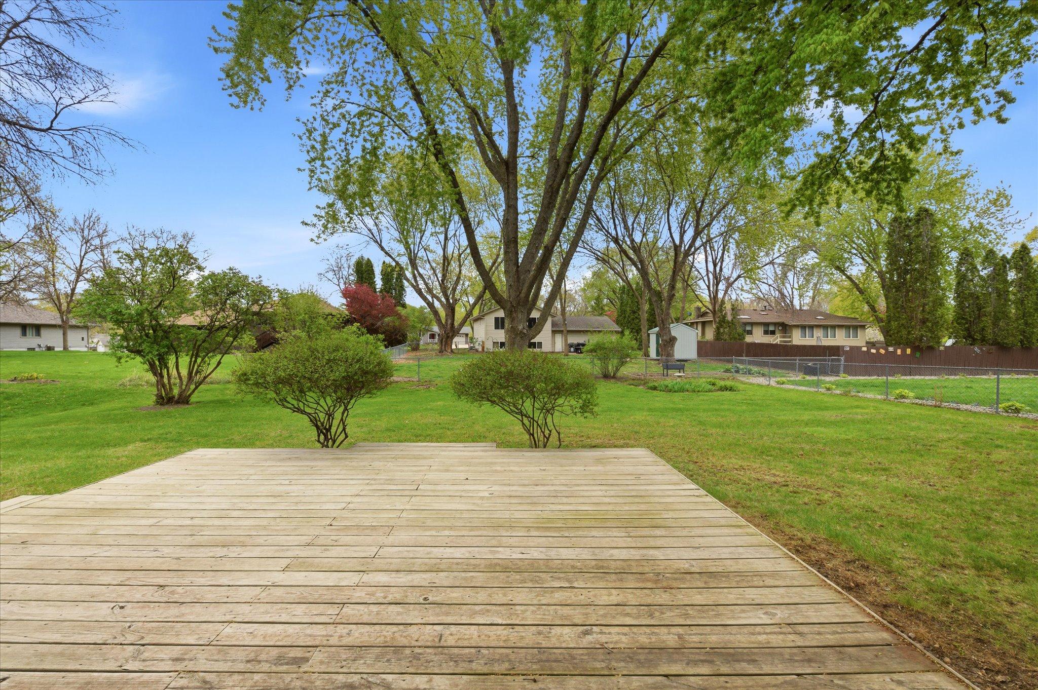 Step outside onto the backyard deck and discover the perfect extension of the family room. Ideal for summer grilling, outdoor dining, or relaxing evenings, this space makes enjoying Minnesota’s warmer seasons even more inviting.