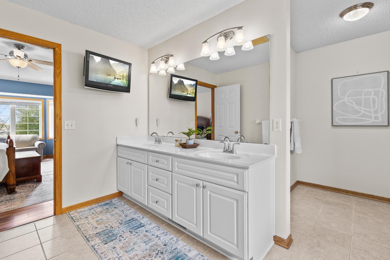 Newly re-tiled shower and tub surround (2024)