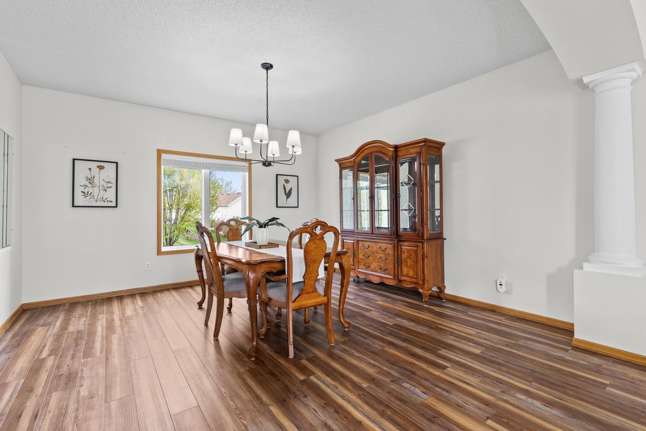Expansive formal dining room perfect for hosting gatherings
