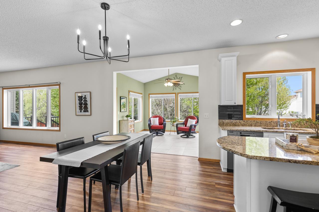 Open flow to informal dining area and sunroom