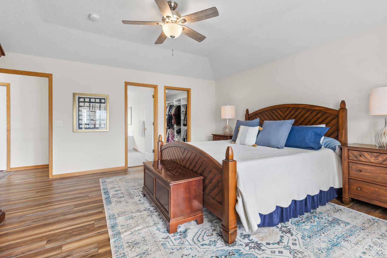 Spacious primary suite with vaulted ceilings
