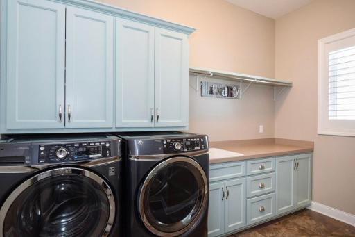 Built in custom cabinets in main floor laundry