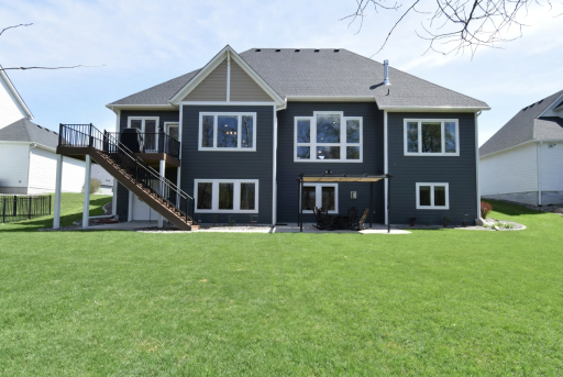 View of back Patio & deck. private setting perfect for entertaining