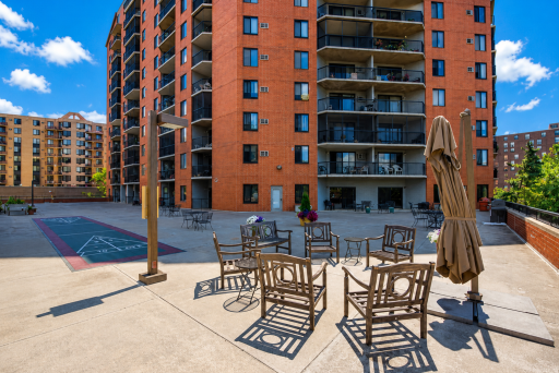 Beautiful community deck with activities and plenty of seating.