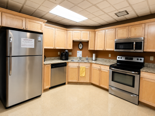 Expansive Community Room complete with full kitchen, pool/ping-pong, table, piano, games and activities, TV, library where you can borrow books,