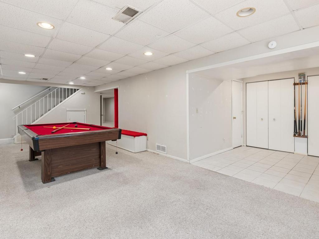Lower level Amusement Room and storage area.