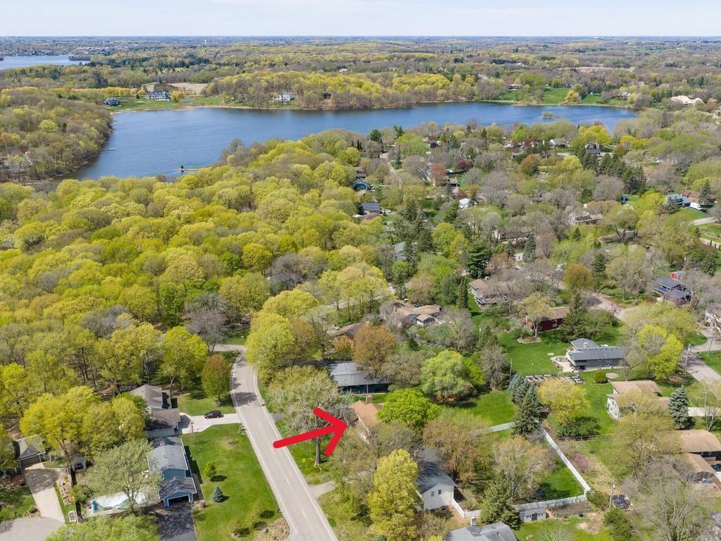 Home is nestled in Wayzata School District near Mooney Lake.