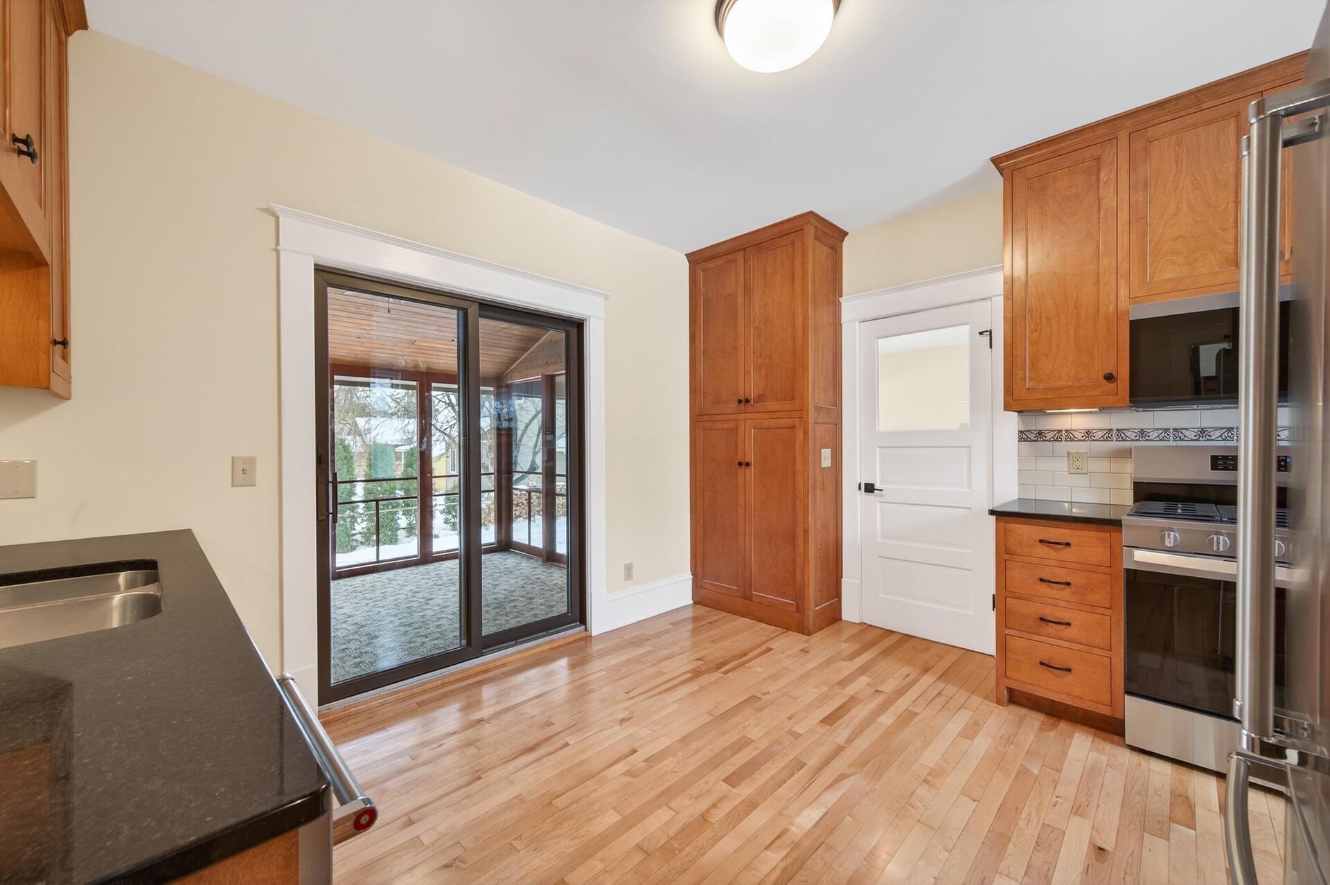 SUN-ROOM DIRECTLY OFF OF KITCHEN!