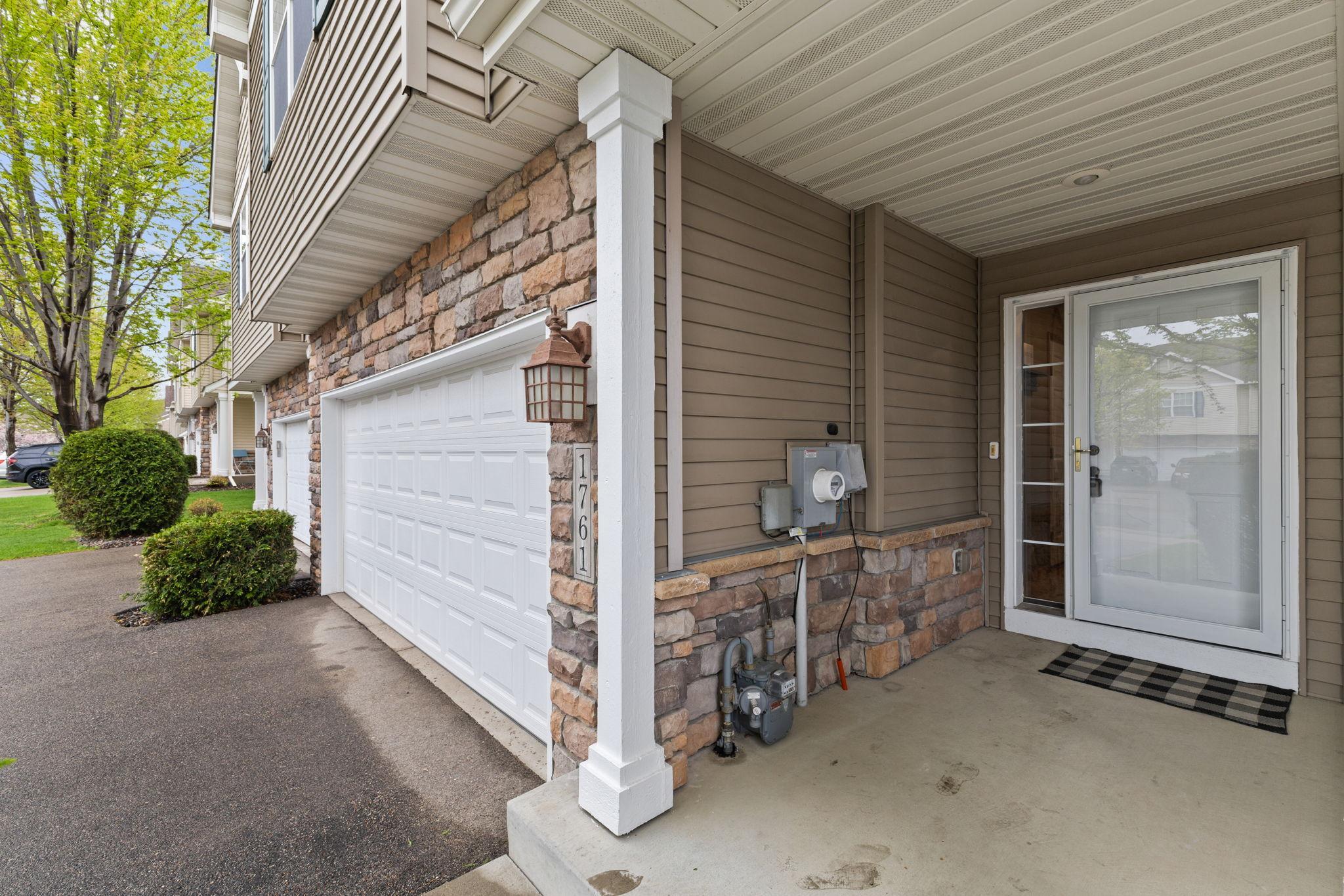 This covered west-facing front entry way is great to have. Add a couple of chairs and table and you have a front outside patio to the sunset or later Minnesota nights.