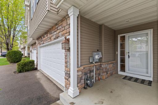 This covered west-facing front entry way is great to have. Add a couple of chairs and table and you have a front outside patio to the sunset or later Minnesota nights.