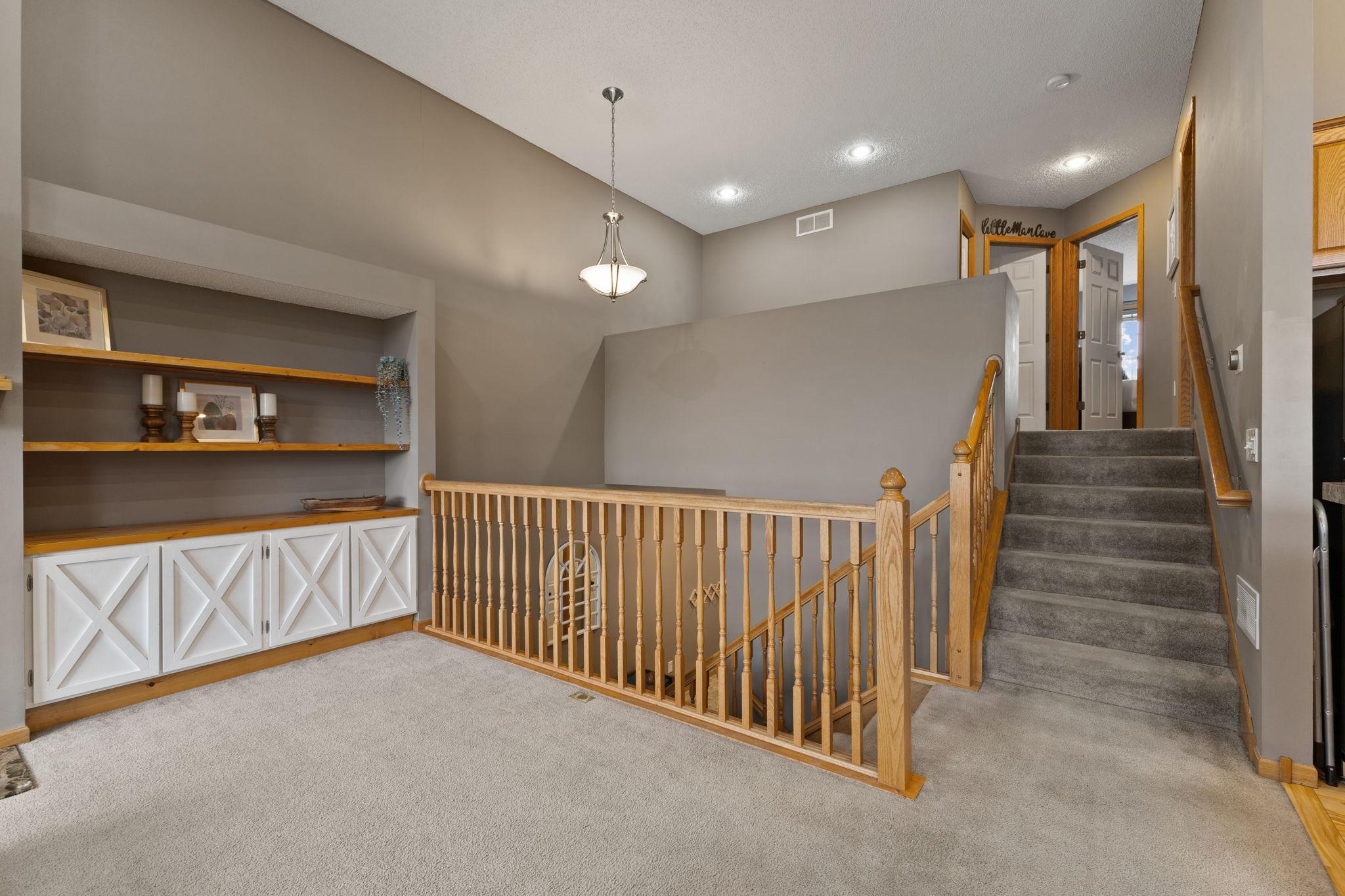 Floor outlets are great to have! The upper level takes you to a loft, two bedrooms and a full bathroom with a separate tub and shower.