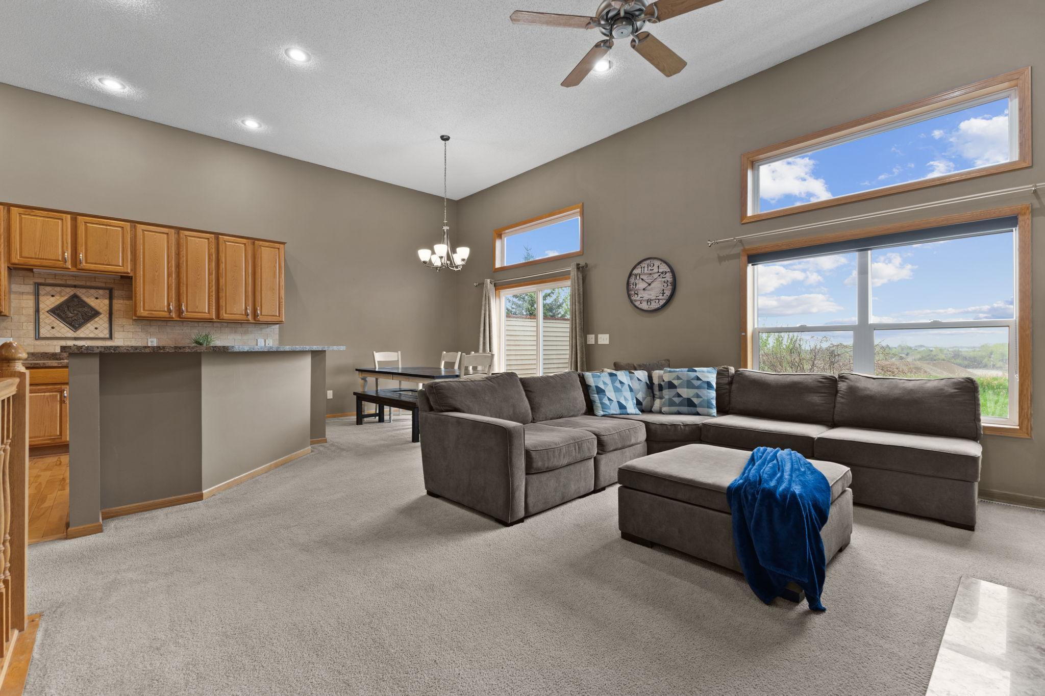 The natural light here speaks for itself - walls of windows flooding this level with light from every angle. You don't even need to turn your lights on!