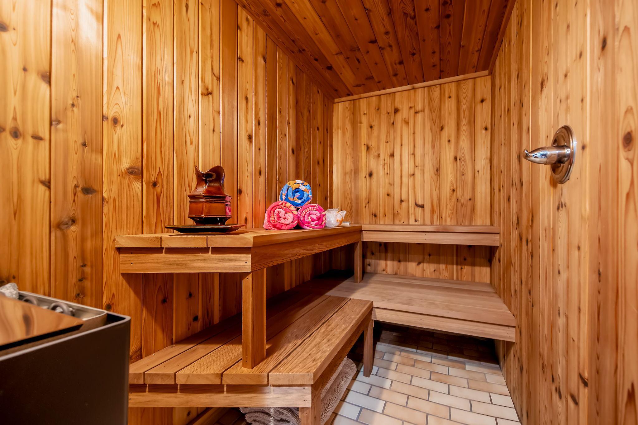 Sauna has a brand new heater, tile floors and shower.