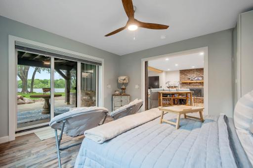 Third bedroom walks out to its own private 22' X 13' covered patio with ceiling fan. This room can be flex space and would make a great billiard/game room or extension of the family room if wanted.
