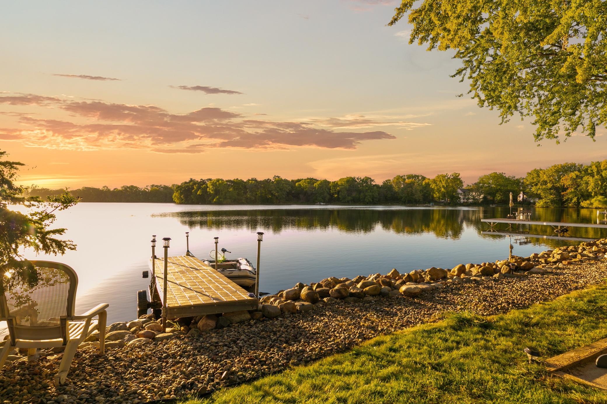 West Facing Roger Lake home in Mendota Heights. HOme has been entirely renovated form top to bottom-brand new electric, plumbing-everything and was designed to take in view of the lake from every room in the home. See today.
