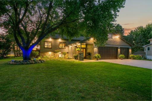 A covered front porch combined welcomes you home. The entire exterior is has upgraded with LP siding, real natural stone accents. Teak oversized garage doors open to a 768 sq ft fully insulated, heated garage plus a new concrete drive (fall 2024).
