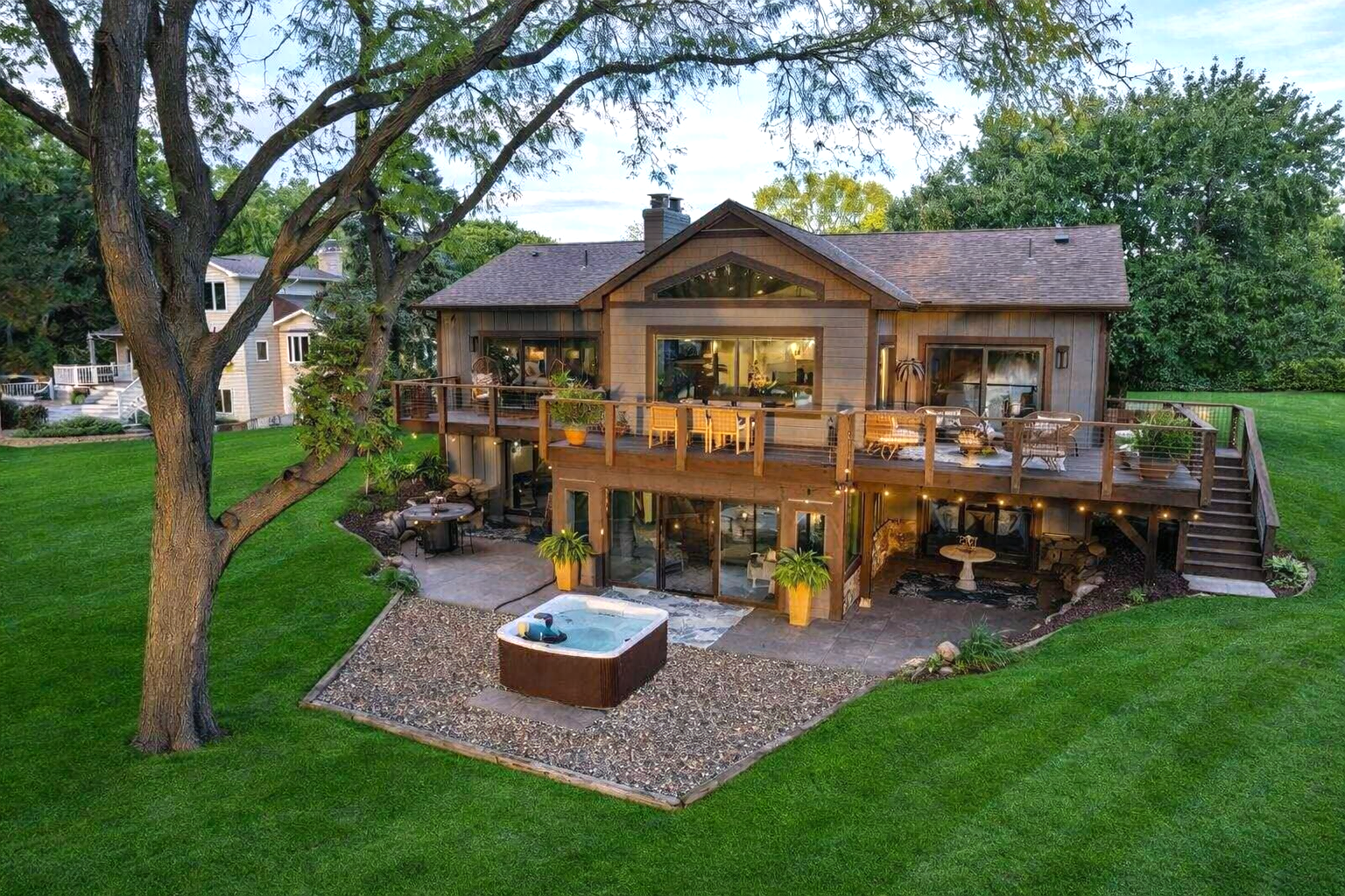 Over 1,700 sq. ft. of patios and decks extend the living space outdoors—ideal for entertaining or quiet evenings by the water. Three of the 4 bedrooms each enjoy private decks or covered patios, offering personal sanctuaries.