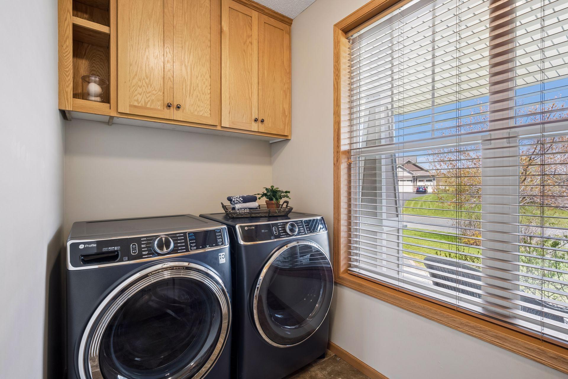 Main level laundry with new front loader laundry