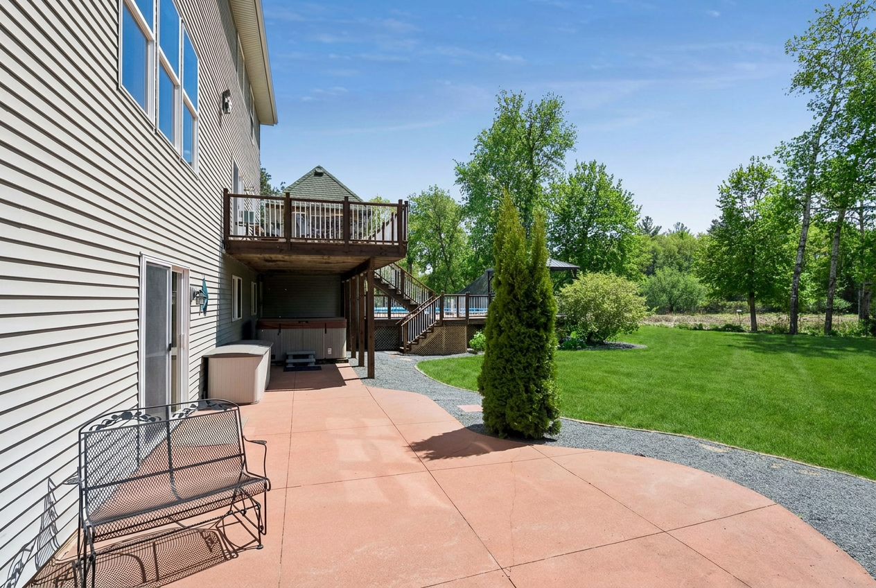 This stunning walk-out leads to a spacious patio and is complete with a private hot tub.