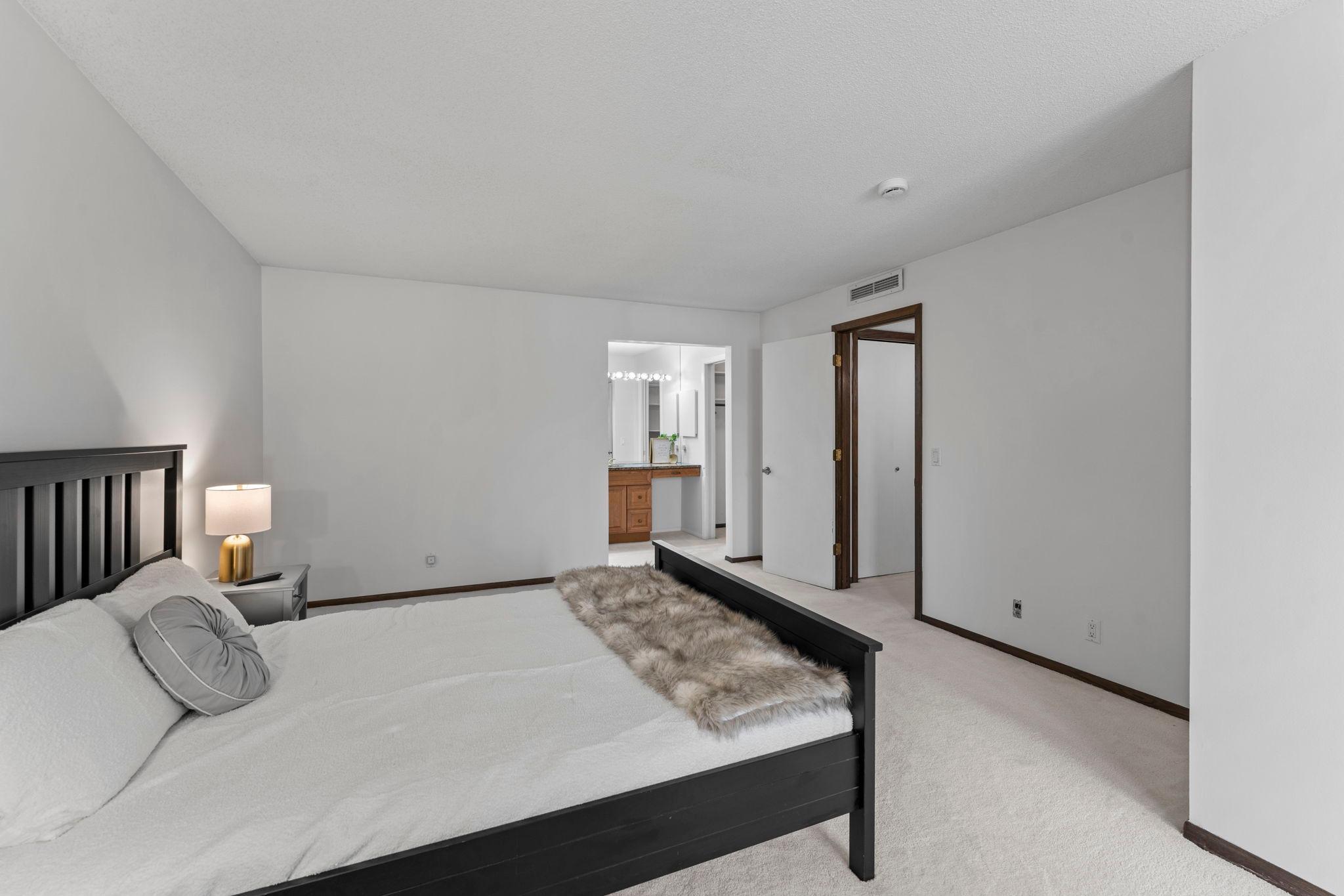 Primary bedroom and bathroom