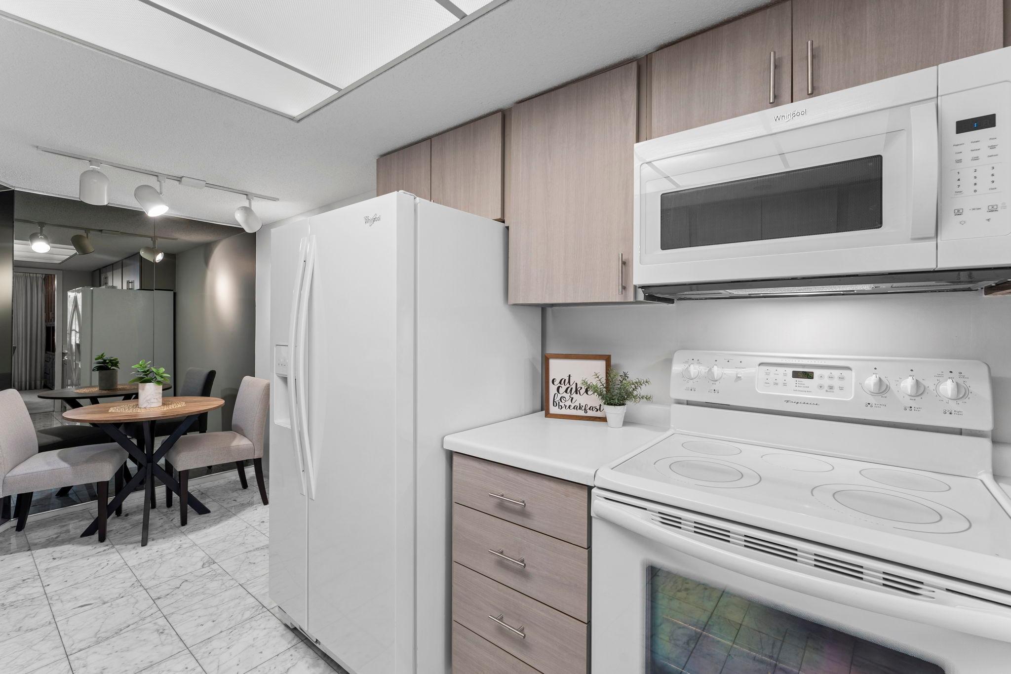 Kitchen and eat in kitchen area