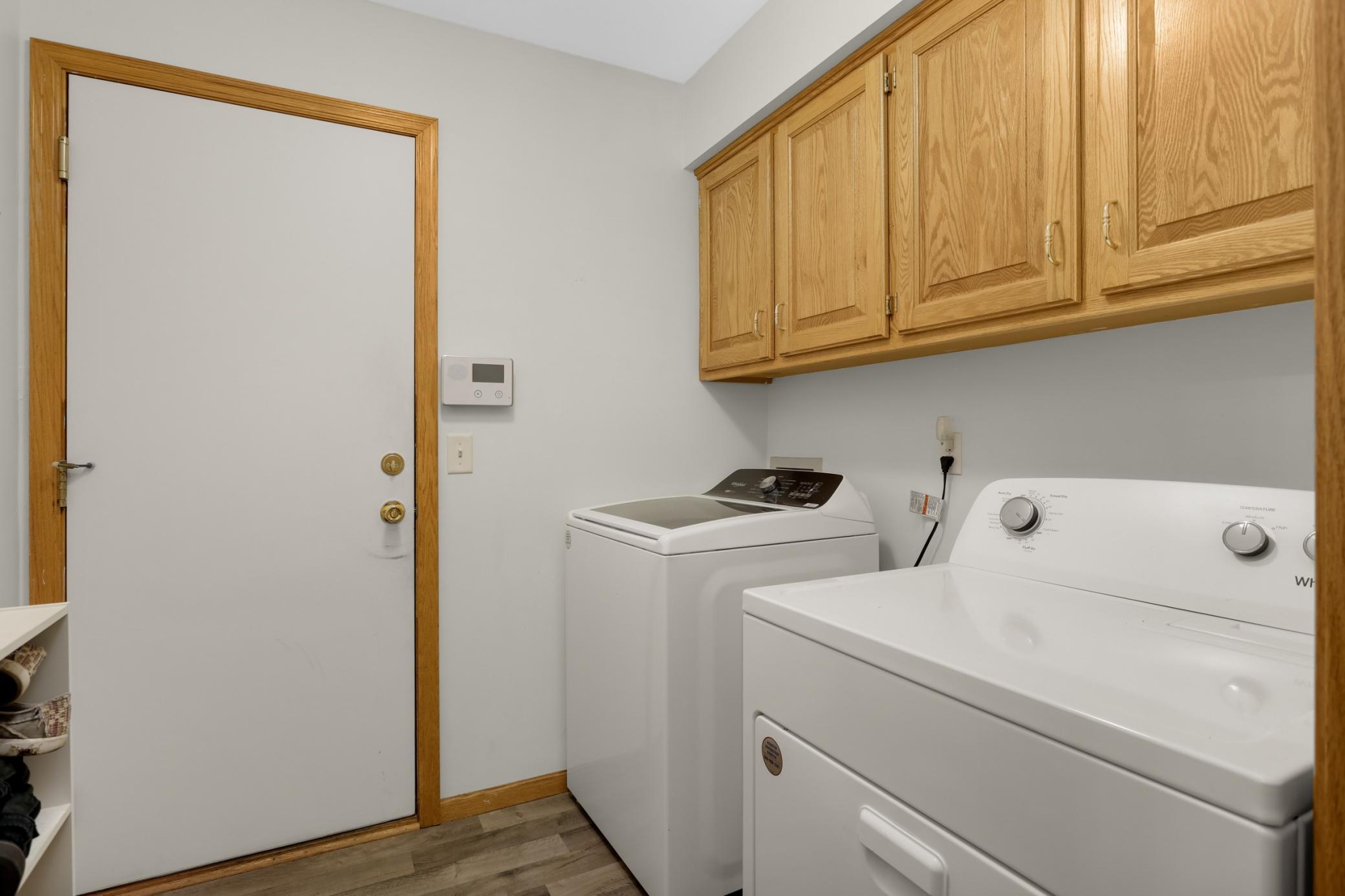 Enjoy a new air washer and dryer and plenty of storage in the mudroom.