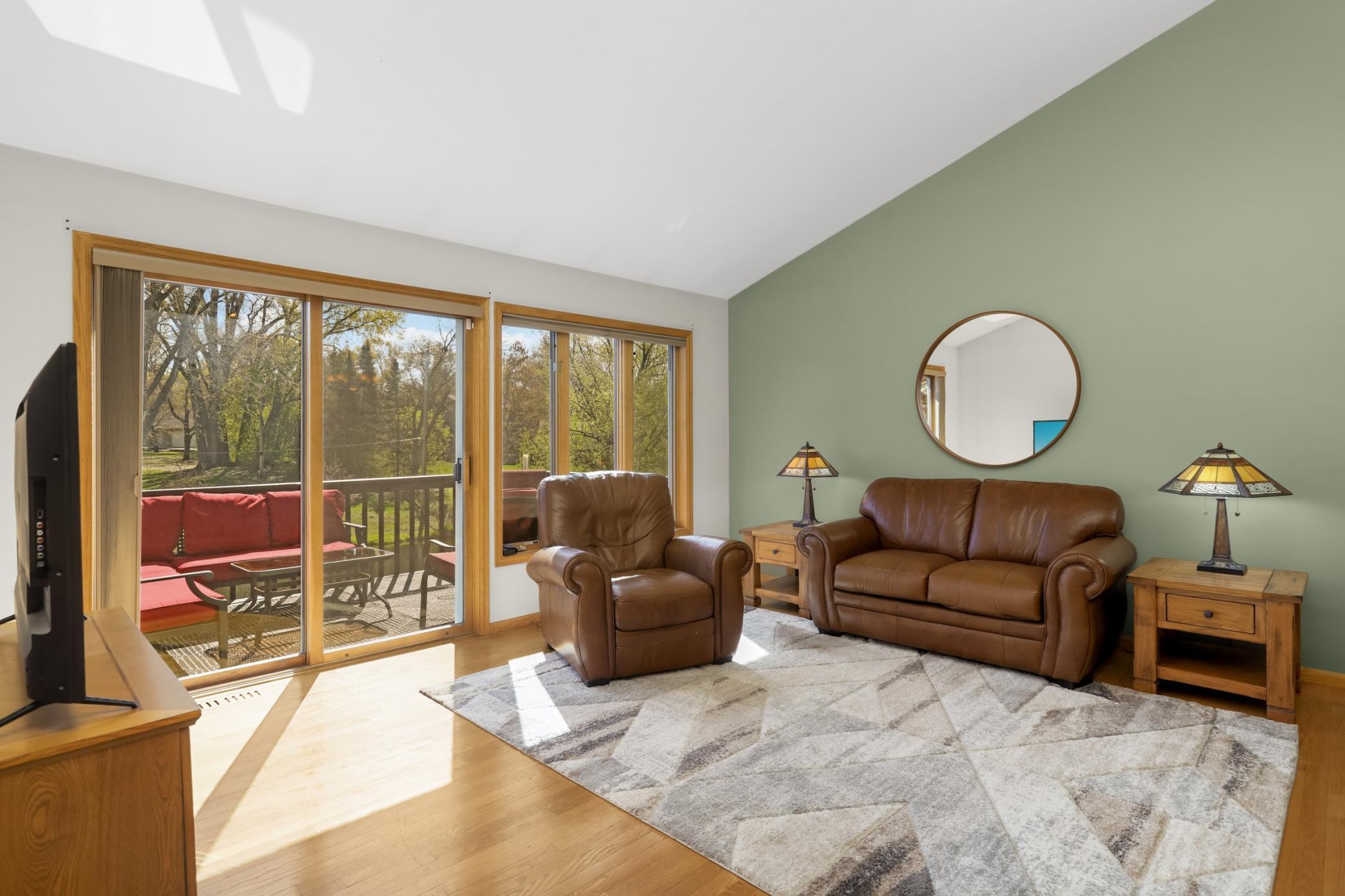 You'll love the vaulted ceilings, natural light, and gorgeous hardwood floors!