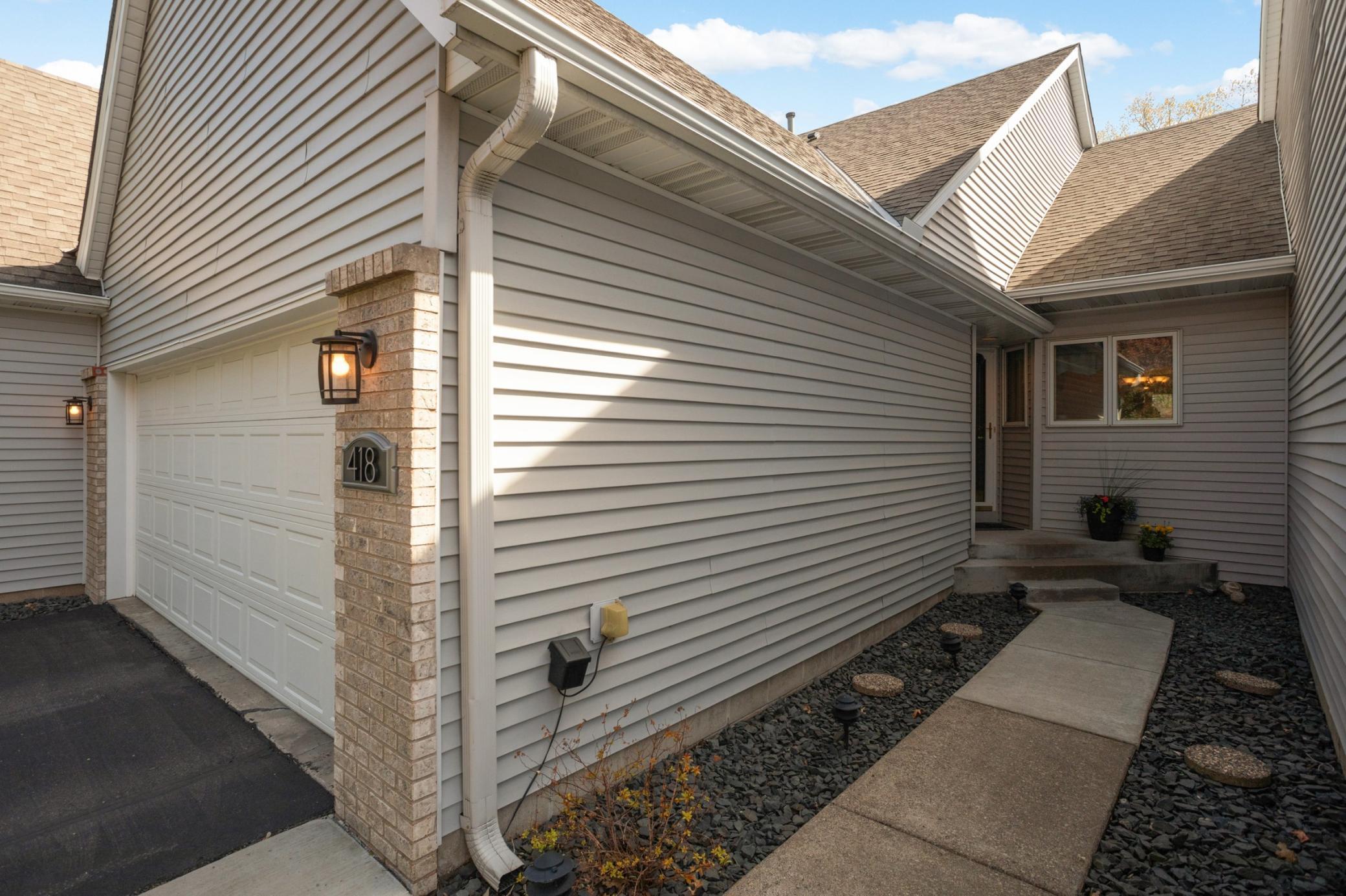 This front space is waiting for your creativity. Add a cute little bench or add a bunch of flower pots and really see this space pop.