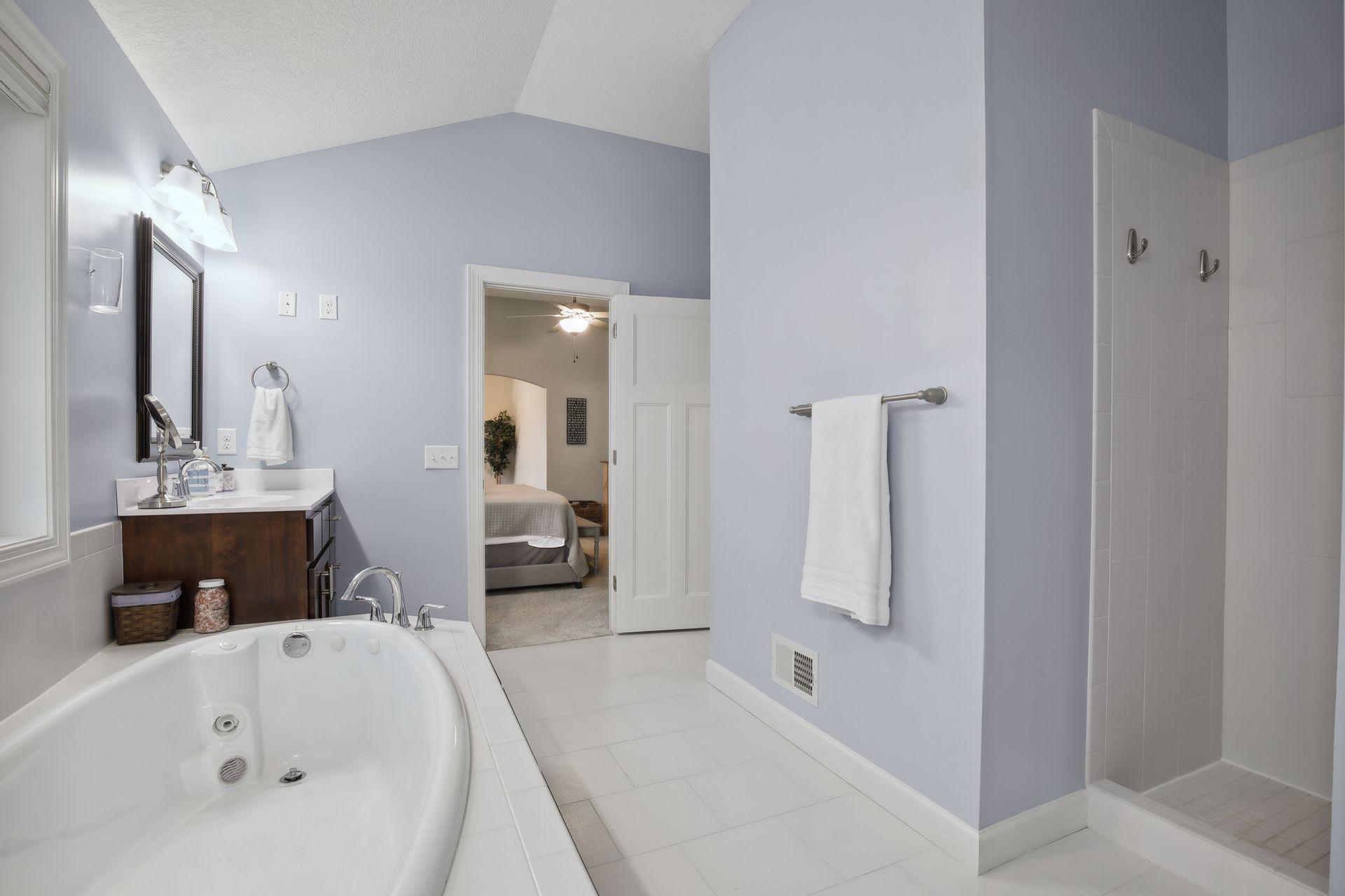 Nice sized tub and walk-in shower.