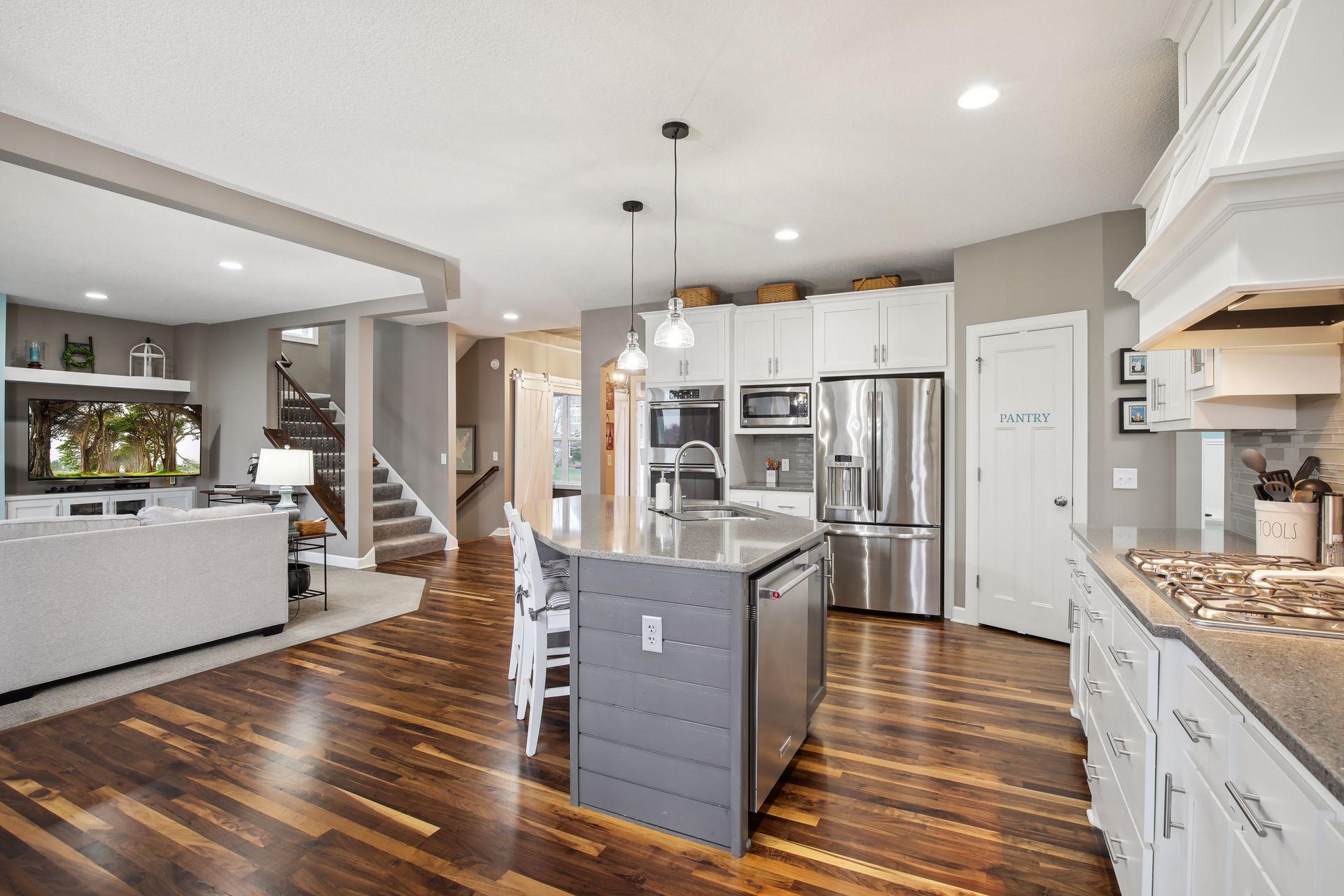 Center island with sink and seating