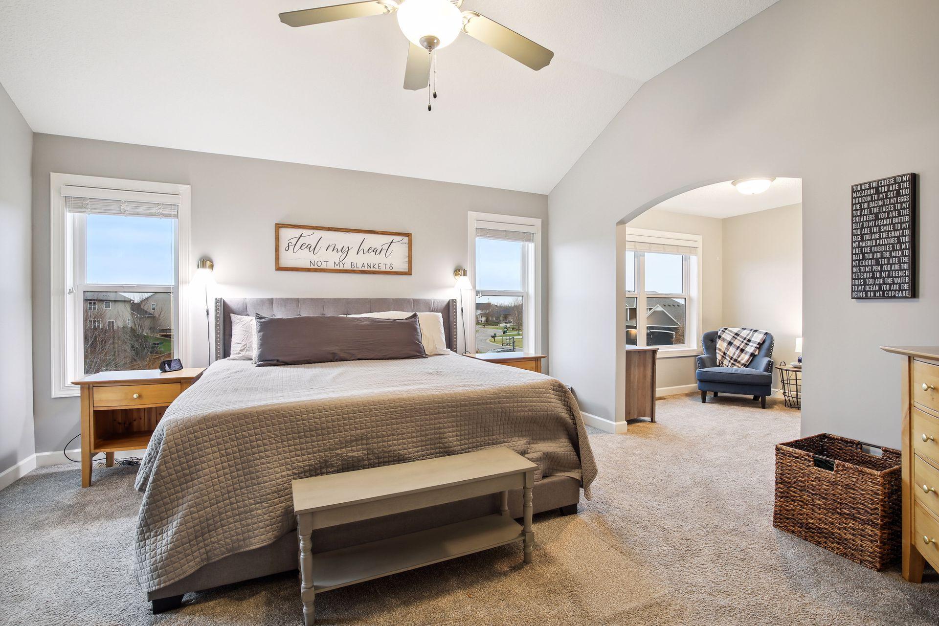 This expansive owner's suite has a sitting room located off of it which is currently used as a third walk-in closet/changing room. (Updated photos are coming.)