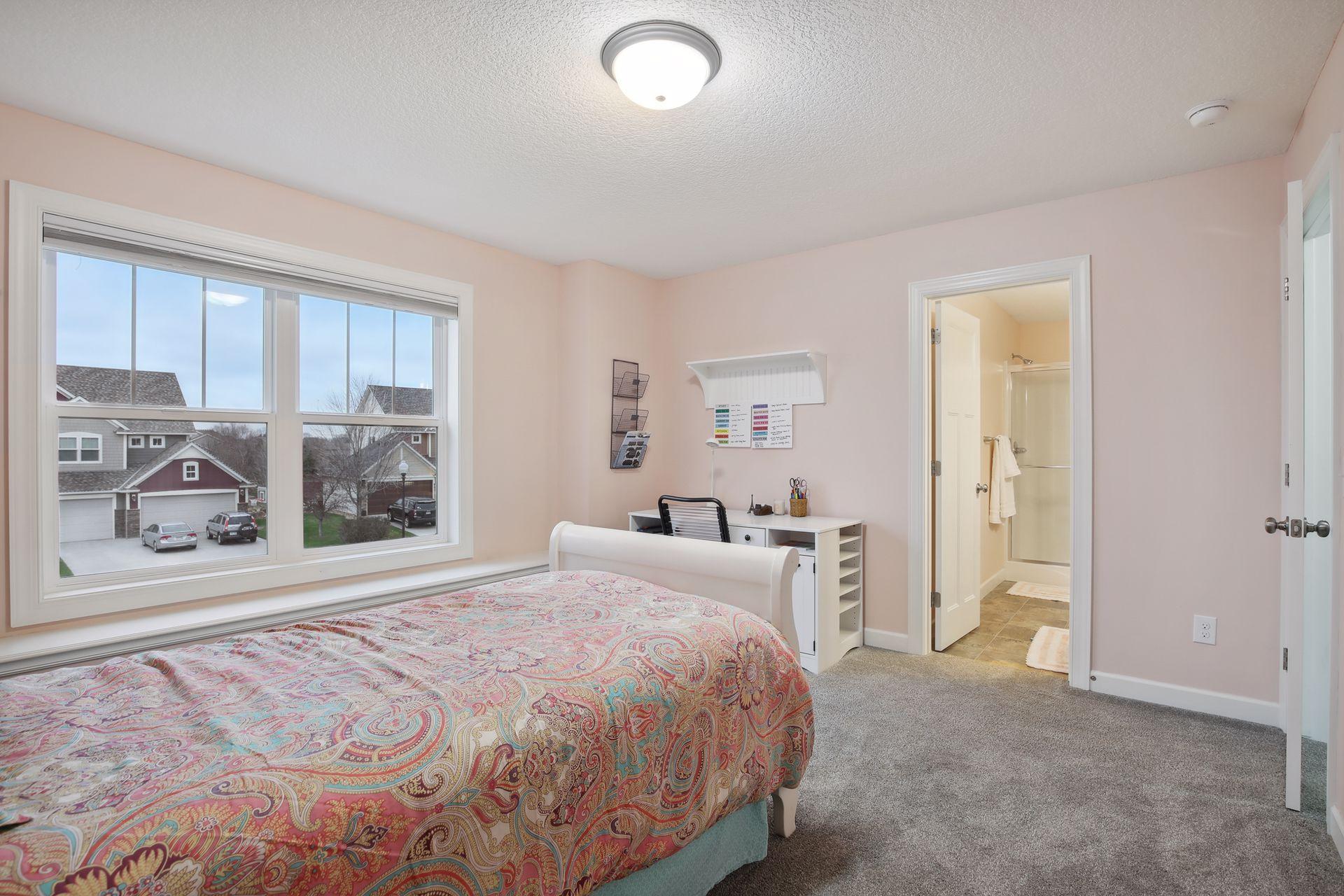 Second bedroom up has 3/4 en suite bath and walk-in closet